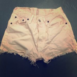 Vintage pink Levi denim ripped cut offs